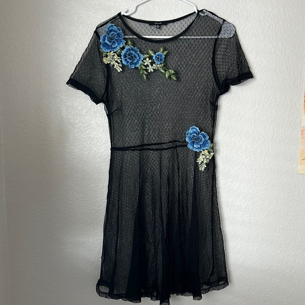 Black mesh skater dress with a blue flower details